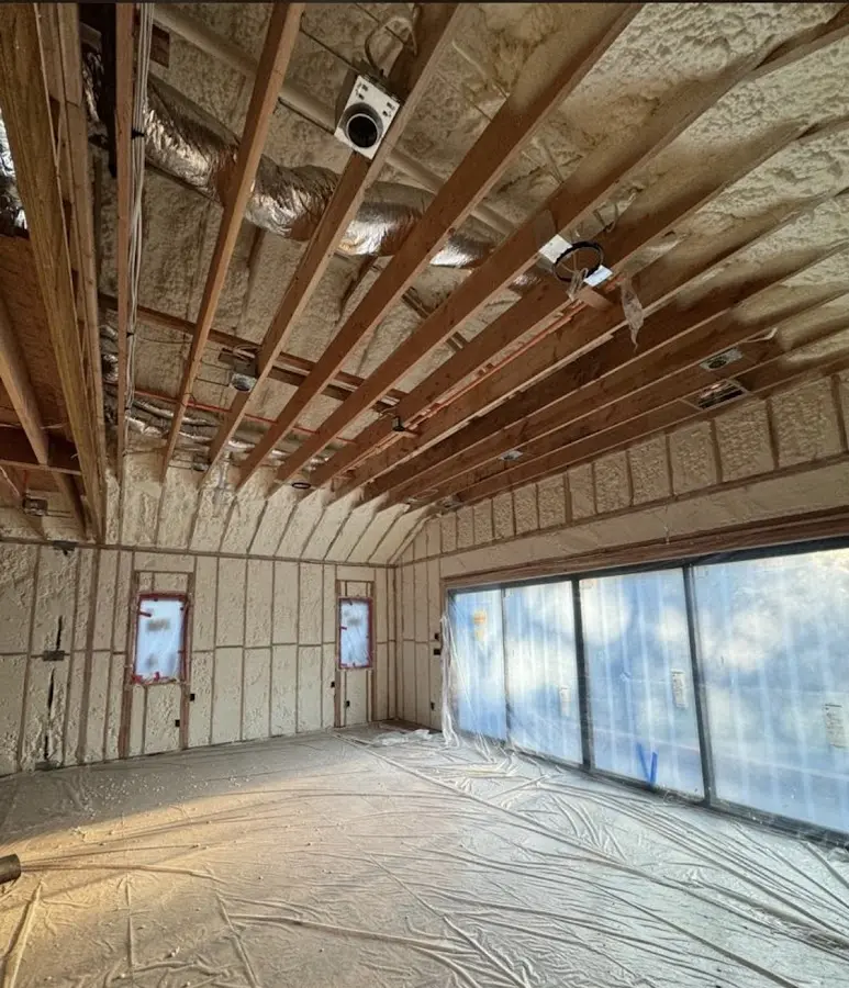 Interior walls and ceiling insulated with spray foam during new construction in St. Martin